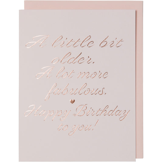 Birthday Card. Rose Gold Foil Embossed on light pink cotton paper. A Little Bit Older A Lot More Fabulous Happy Birthday To You! With blush envelope.